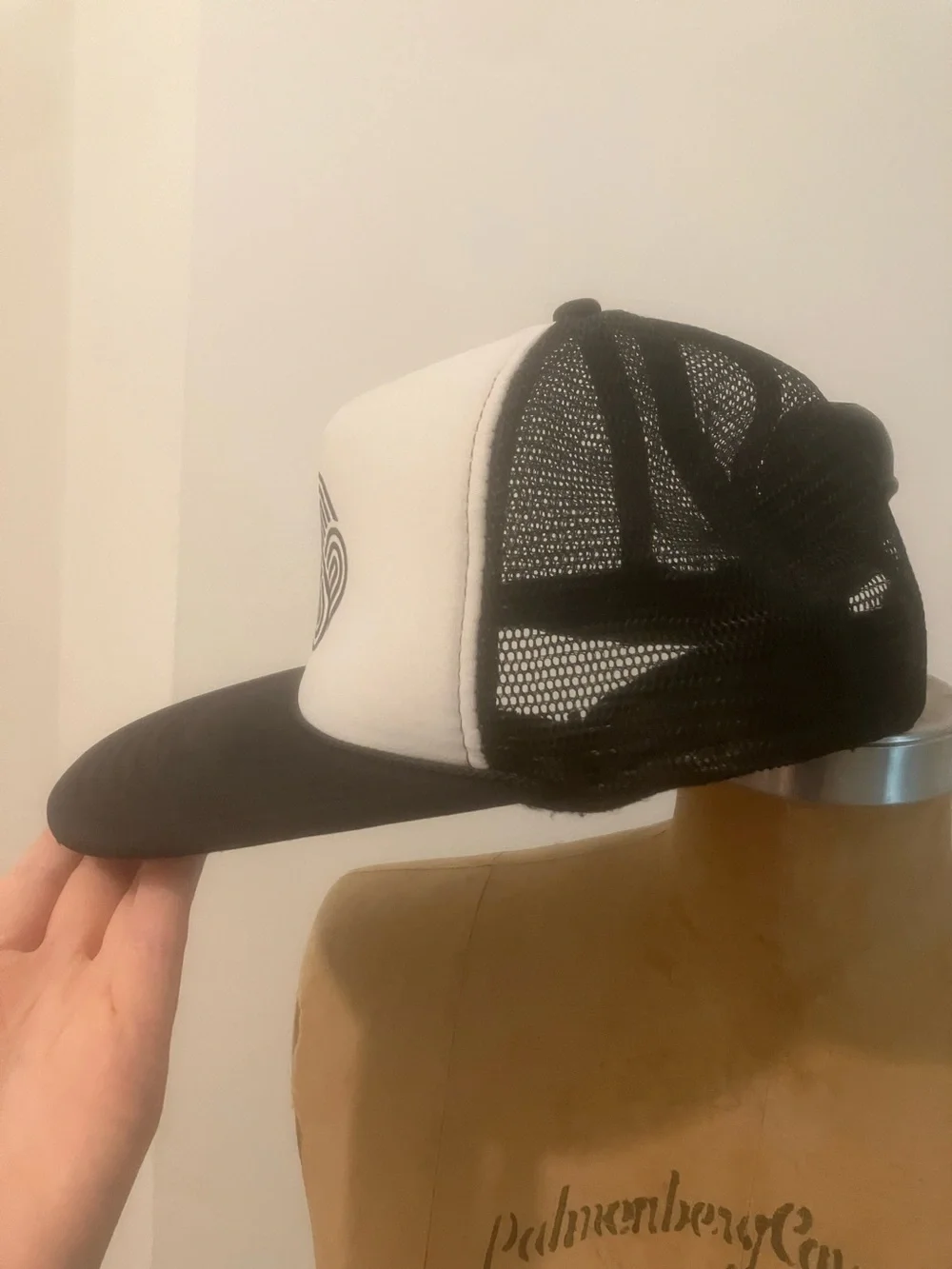 Black & White Trucker Hat with Geometric Emblem